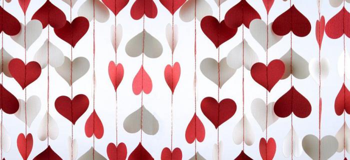 red and white paper cut heart garland