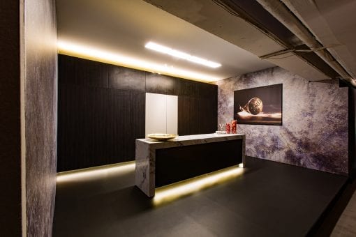 A bespoke kitchen with kitchen island for a corporate product launch at the dry hire venue the Vinyl Factory in London