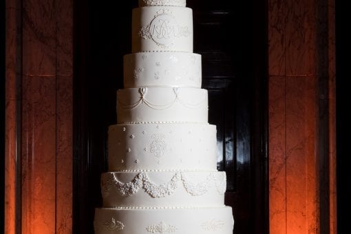 Luxury ten tier white wedding cake decorated with handmade iced flowers based on the Royal Wedding Cake designed for William and Kate