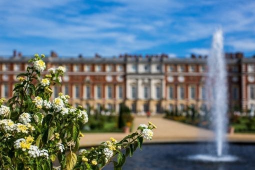 Hampton Court Palace exterior with beautiful flower arrangements