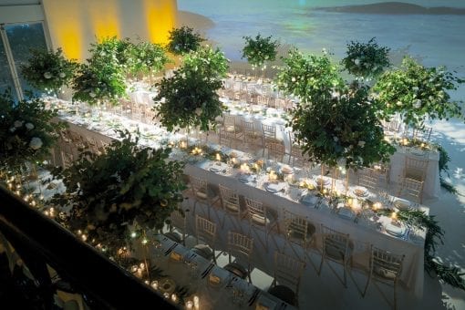 Beautiful tables prepared for a lavish wedding reception at luxury venue in London