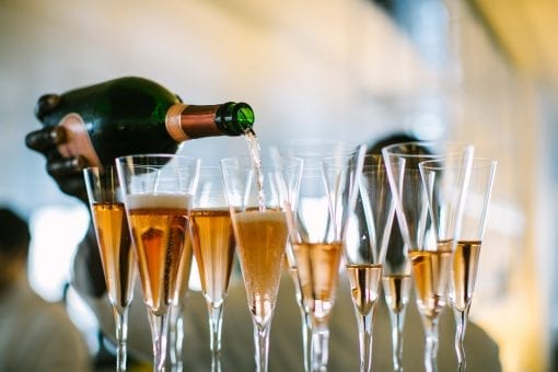 Champagne being poured at a drinks reception for a corporate event in London