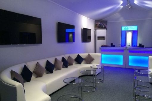 Soft seating in a bespoke built branded marquee at Silverstone