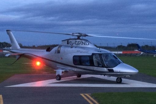 Private helicopter taking off at the end of a corporate event at Silverstone