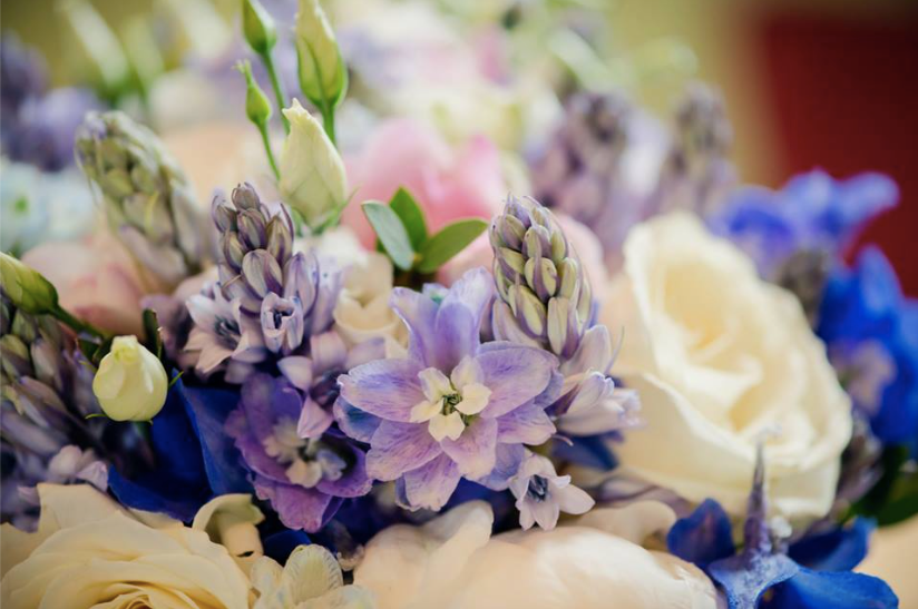 Pretty countryside wedding with a beautiful bridal bouquet for a high end wedding