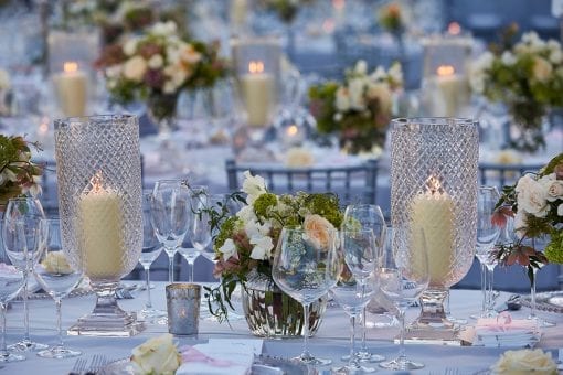 Elegant tablescape design with pinks, greens and creams for a luxury wedding reception at Blenheim Palace in Oxfordshire