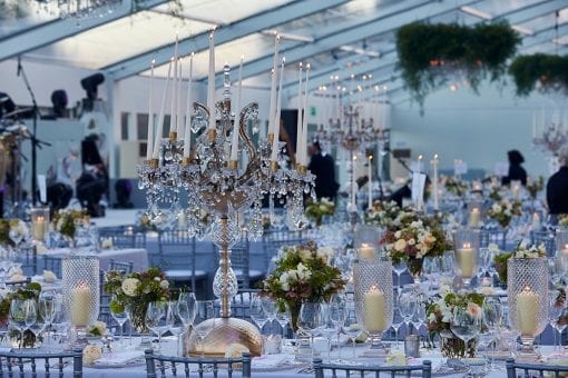 Opulent tablescape design in a glass marquee at a luxury wedding reception in Blenheim Palace