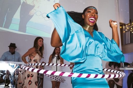 Smiling wedding guest at a high end celebrity wedding in London