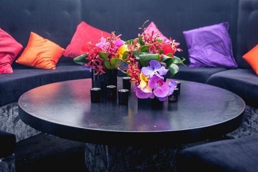 Colourful cushions on soft seating at an event at Battersea Power Station