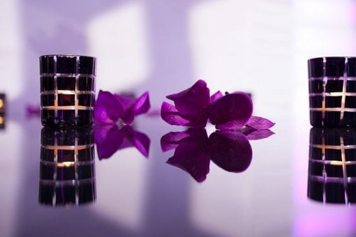 Delicate purple orchid heads at a private event