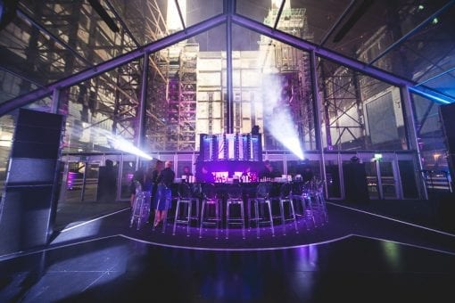 A bespoke bar in a glass structure at Battersea Power station for a private event in London