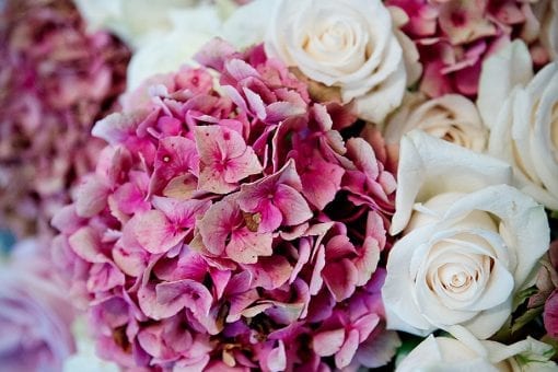Beautiful pink hydrangeas and white roses at a luxury wedding in the Cotswolds