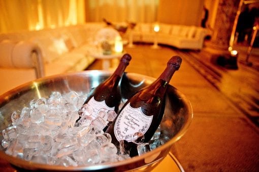 Chilled bottles of Dom Perignon vintage rose at a luxurious wedding reception at the V&A Museum