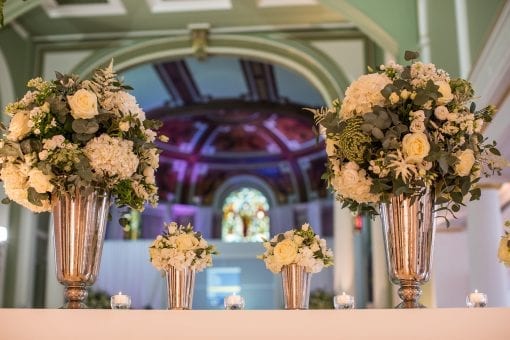 A beautiful green and white floral design at One Marylebone in London for a private event