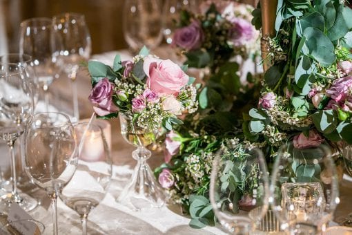 Detail of opulent table setting at a luxury wedding in the Victoria and Albert Museum in London