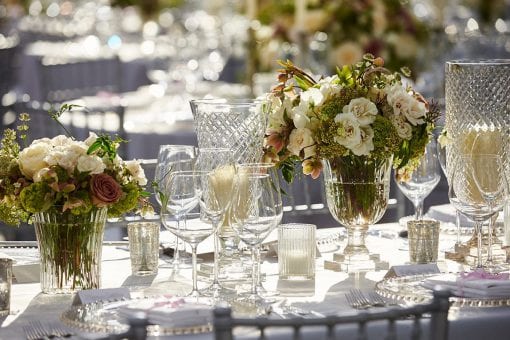 Crystal glassware on table settings for a high end luxury wedding Blenheim Palace