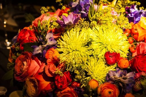 Bright and colourful flower arrangements for a private event