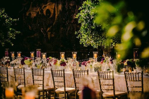 Incredible long tablescape set for dinner in the Great Hall at Hampton Court Palace