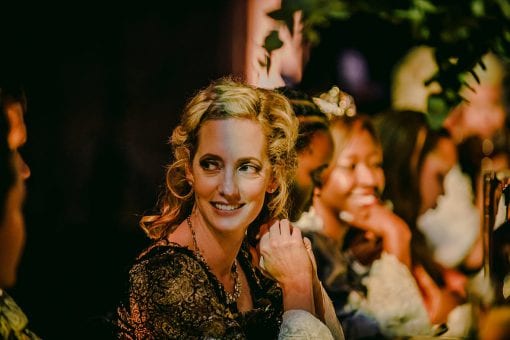 Guests sat at a lavish dinner in Hampton Court Palace