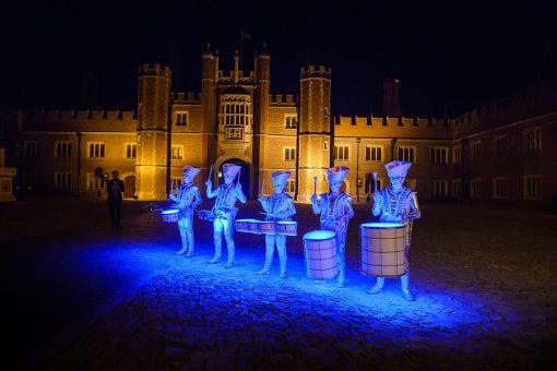 LED drummers lit up ready to perform at Hampton Court Palace