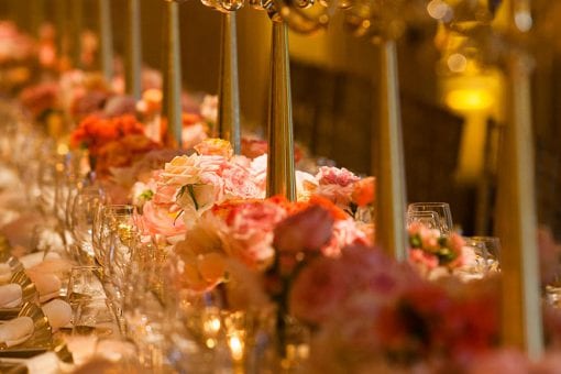 High budget floral table runner with gold candlesticks
