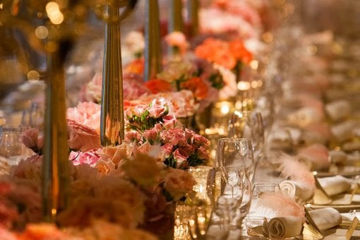 High budget floral runner with amazing place settings for a celebrity