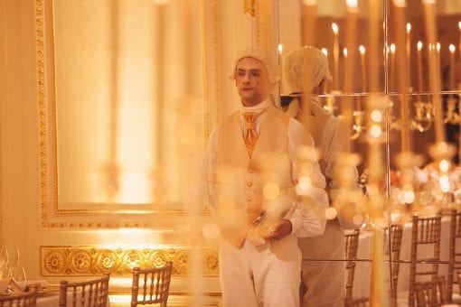 An amazing party with waiters in period costume for a Marie Antoinette themed party