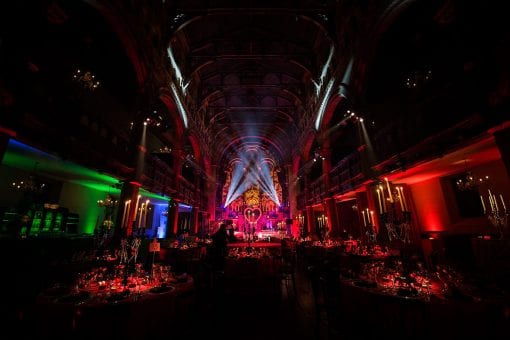 A full set design and stage ready for a moulin rouge themed party in Mayfair