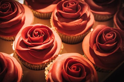 Beautiful bespoke red velvet rose cupcakes for guest goody bags at a private party in Mayfair
