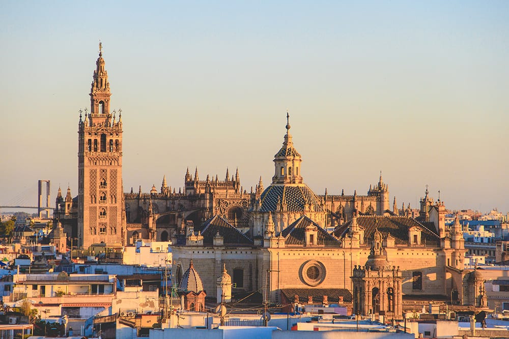 A view of the Seville Cathedral in Spain at sunset for a destination wedding